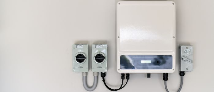 A solar panel system with a solar inverter converting DC power to AC power