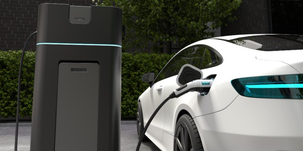 A man looking for qualified installers for electric car chargers